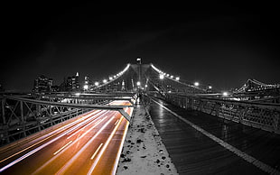 time lapse photography of gray bridge during night time
