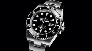 round black Rolex analog watch with silver-colored link band
