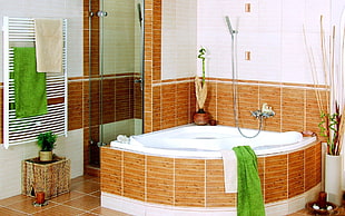 brown and white hot tub in bathroom