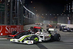 white f1 cars racing on the track HD wallpaper