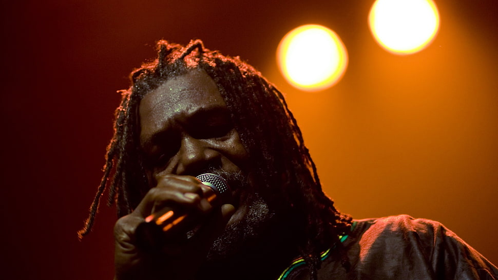 man holding microphone selected photography HD wallpaper