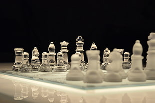 close-up photo of glass chess set