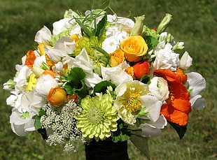 bouquet of white, orange and red flowers