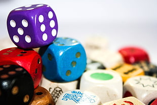 assorted colored plastic dice
