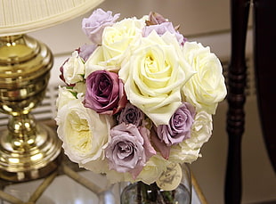 white and violet flower arrangement table decor