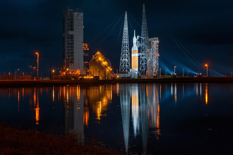 gray skyscrapers during night HD wallpaper