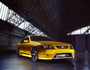 yellow Subaru sedan HD wallpaper