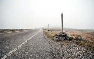 gray concrete empty road