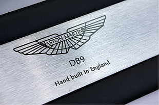 Aston Martin DB9 emblem, car, Aston Martin DB9, closeup HD wallpaper
