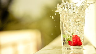 strawberry and drinking glass, strawberries, drinking glass, water