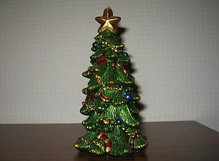 green and red ceramic christmas tree figurine