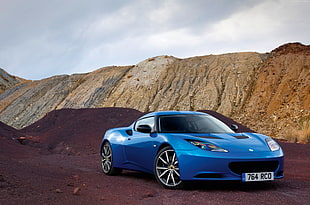 blue supercar with mountain background HD wallpaper