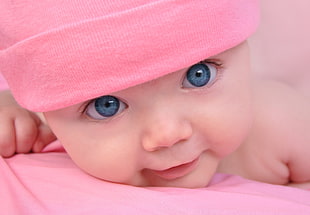 baby in pink knit cap HD wallpaper