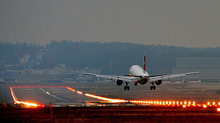 white airliner, airplane, landing, airport, jet fighter