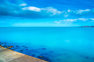 ocean with blue sky reflection and cloud formation photo, ireland