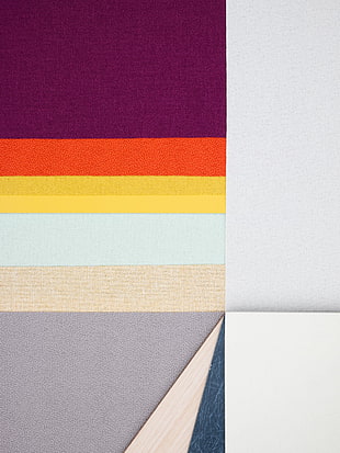 purple, orange, and yellow textiles