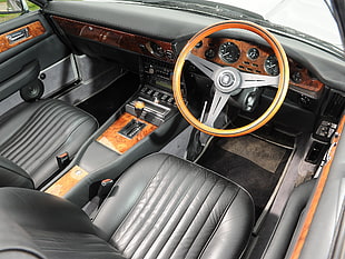 black and chrome car steering wheel