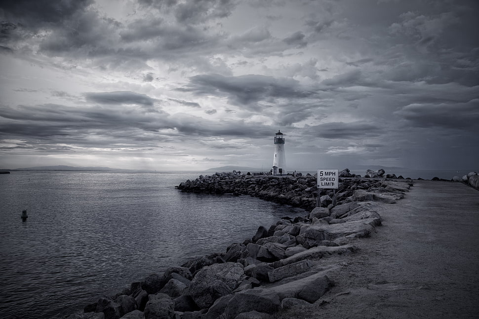 grayscale photo of a lighthouse HD wallpaper