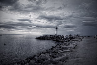 grayscale photo of a lighthouse HD wallpaper