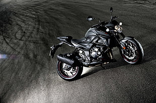 black naked motorcycle on racetrack HD wallpaper