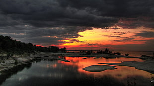 body of water and land, landscape, sky, sunlight, clouds