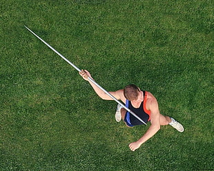 high-angle view of man holding javelin