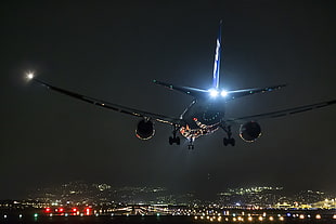 photo of airplane during dusk