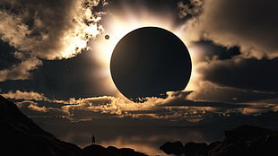 man standing on mountain during solar eclipse HD wallpaper