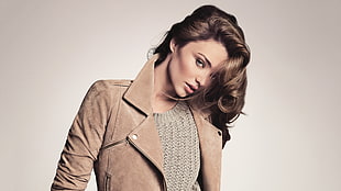 woman wearing brown suede coat