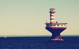 white and red lighthouse, lighthouse, sea