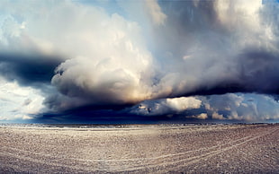 fish-eye photograph of cumulus clouds