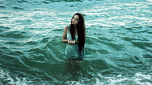 woman on body of water HD wallpaper