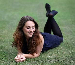 woman on grass posing HD wallpaper
