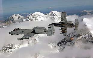 two gray military planes photo