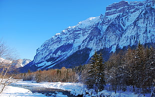 snow covered mountain photograph