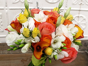 yellow, white, and pink Rose flower arrangement