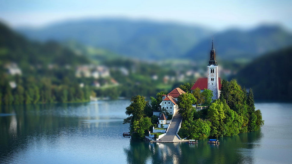 islet with house, tower, and slide HD wallpaper