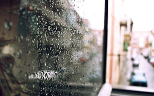 selective focus photography of water droplets on glass panel, rain, water on glass