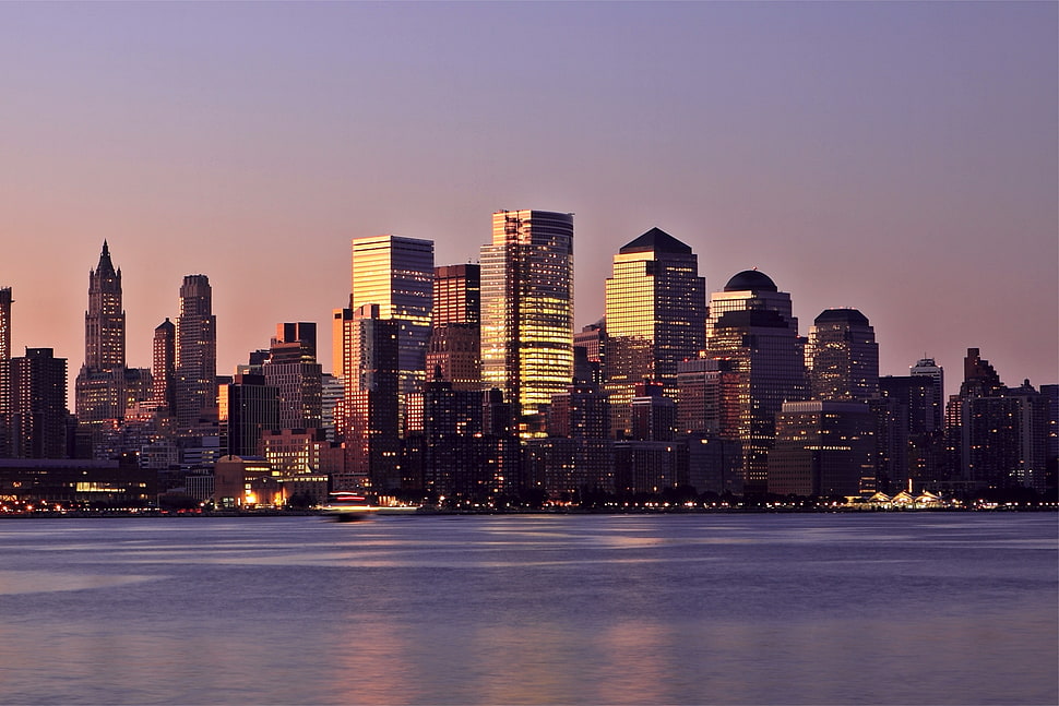 city skyline at golden hour HD wallpaper