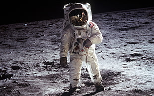 astronaut on brown sand