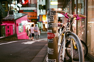white rigid mountain bike near brown wooden pole, tokyo HD wallpaper