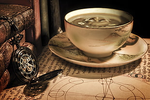 coffee on teacup and saucer