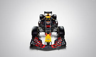 yellow and red F1 car