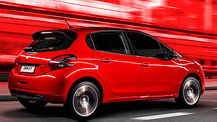 red Peugeot 5-door hatchback wallpaper