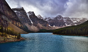 mountain beside river during daytime, moraine lake, banff national park