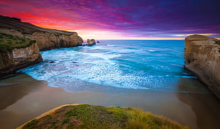 brown sandy beach photo, sunset, cliff, beach, sea