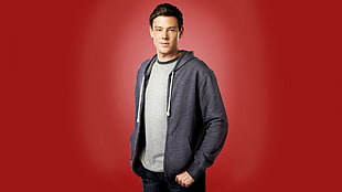 man in grey zip-up jacket with red background illustration HD wallpaper