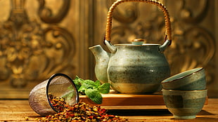 white and gray ceramic bowls and kettle
