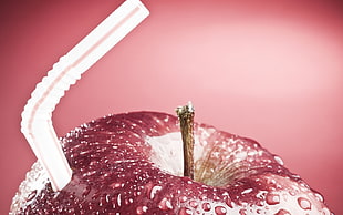 red Apple fruit with straw