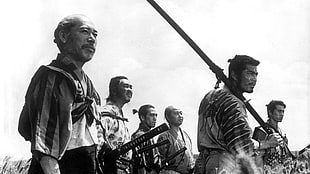 gray scale photo of samurais